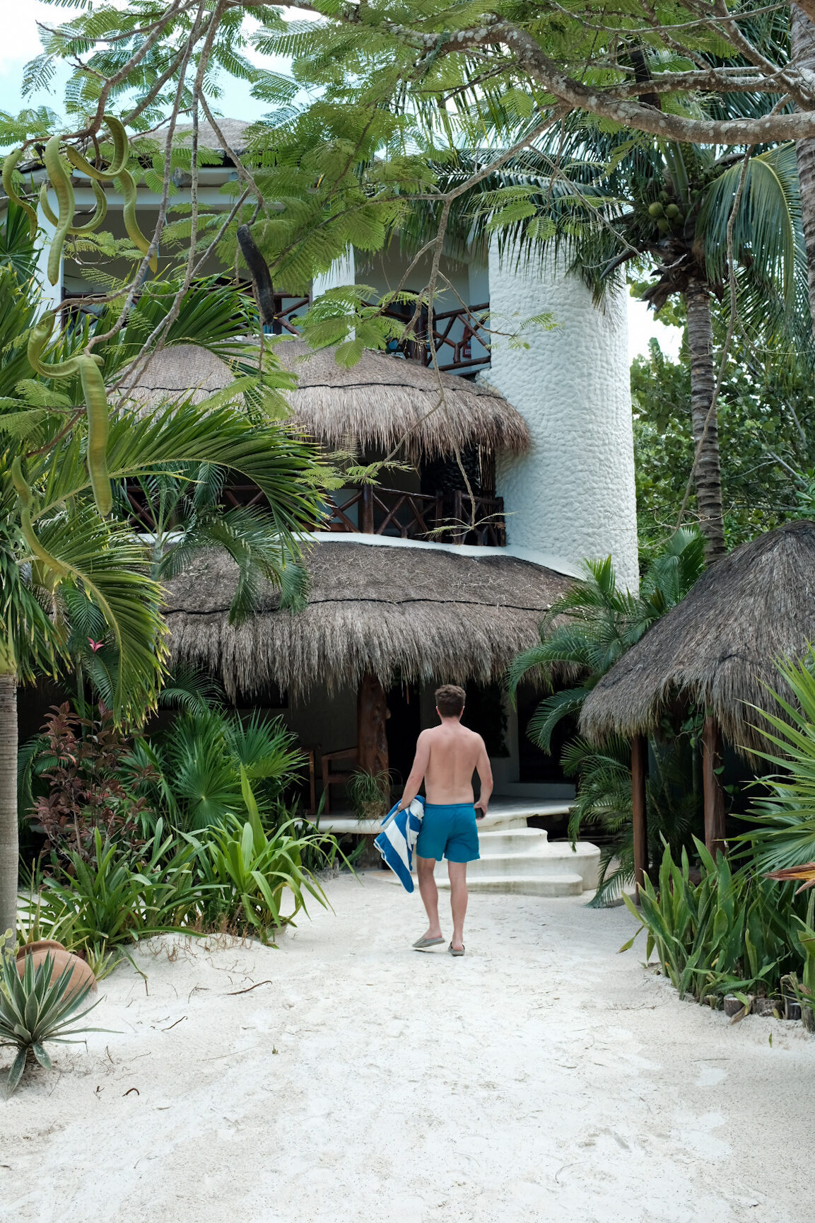 Walking toward a beachfront villa